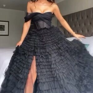 It's milla Timeless one-shoulder frill-layered ball gown in black